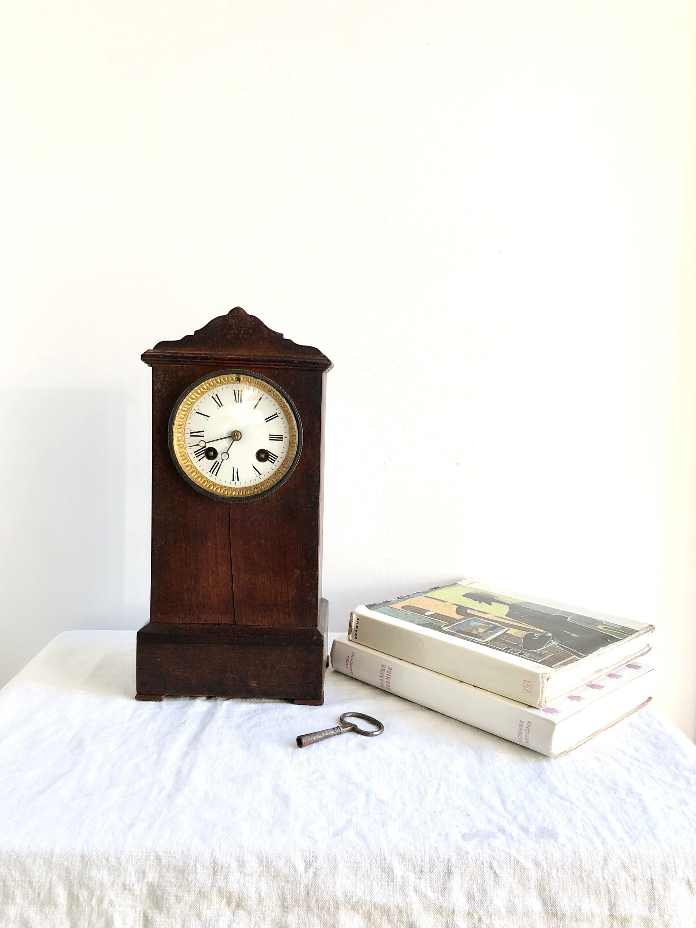 Antique terminal clock with Paris movement in a wooden case