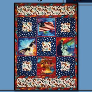 May include: A patriotic quilt featuring the Liberty Bell, American flag, and Statue of Liberty. The quilt has a blue background with red and white accents. The text "Liberty Bell" is at the top.
