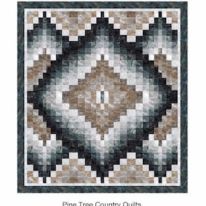 May include: A quilt pattern called "Surface Diamonds" with a geometric design featuring black, white, gray, and brown squares. The pattern is from Pine Tree Country Quilts, PO Box 343, Stillwater, ME 04489 (207) 827-3876, www.pinetreecountryquilts.com.