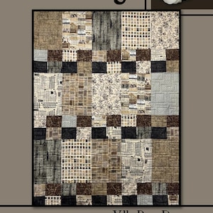 May include: A patchwork quilt with the word "Heritage" in black script. The quilt features squares of various patterns in shades of brown, beige, and black. A white rose is in the upper right corner. The words "Villa Rosa Designs" are at the bottom.