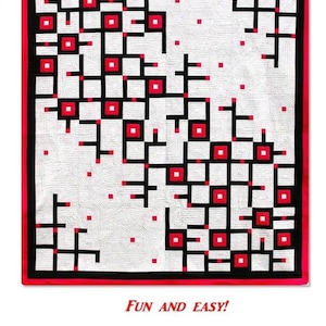 May include: A quilt with a geometric design featuring black lines and red squares on a white background. The quilt has a red and black border. The word "FRACTURED" is at the top, and "FUN AND EASY!" is written below.