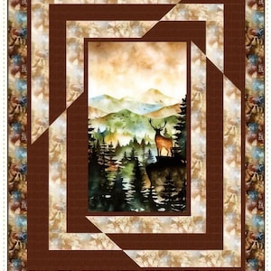 May include: Panel quilt titled "Reversal" with a deer scene. The quilt features a central image of a deer on a cliff overlooking a forest and mountains. The design includes brown and patterned borders, and the text "Quilting Renditions".