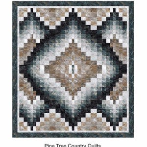 May include: A quilt pattern called "Surface Diamonds" by Pine Tree Country Quilts. The pattern features a diamond shape made up of smaller squares in shades of brown, grey, and white.