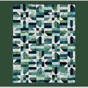 May include: A handmade quilt with a geometric pattern in shades of teal, green, and white. The quilt features the name "Elroy" at the top and the text "Rachelle for Handmade Villa Rosa Designs" at the bottom. The design is a patchwork of various shapes.