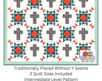 May include: A quilt pattern titled "Rugged Cross" featuring a repeating pattern of gray crosses and geometric shapes in teal, red, and white. The pattern includes two quilt sizes and is an intermediate level pattern.