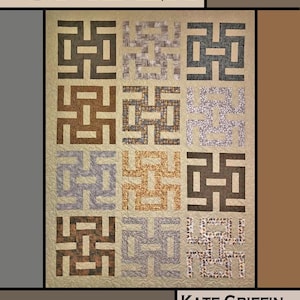 May include: A beige quilt with a repeating geometric pattern in shades of brown, gray, and beige. The word "SPIDER" is at the top. The quilt is designed by Kate Griffin for Villa Rosa Designs.