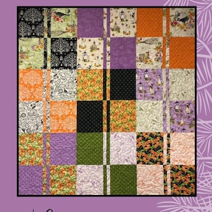 May include: A patchwork quilt with a Halloween theme. The quilt features squares of various patterns, including witch hats, pumpkins, and floral designs, in orange, purple, black, and green. The text "S'Witched" is at the top.