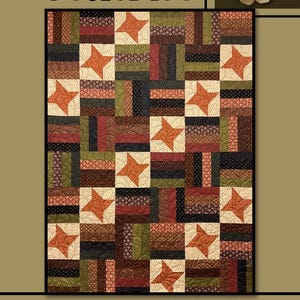 May include: A patchwork quilt with a star pattern. The quilt features squares and rectangles in shades of brown, red, green, and cream. The word "Beatrice" is at the top, and "Villa Rosa Designs" is at the bottom.