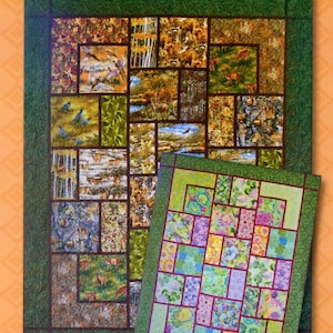 Peut inclure: Un patron de quilt intitulé "Bigger Block" avec un motif de scène de forêt et un plus petit quilt avec un motif floral. Le texte "Quick Camp or Retreat Quilts!" est affiché. Le logo et le site web de Black Cat Creations sont également visibles.