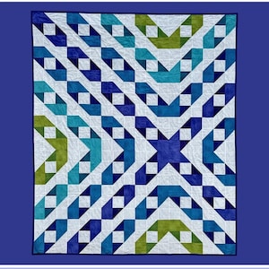 May include: A quilt pattern called "Cadott" designed by Rachelle Handmade for Villa Rosa Designs. The quilt features a geometric pattern of blue, green, and white squares.
