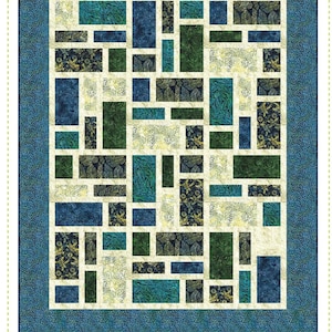 May include: A quilting pattern called "Pavers" featuring a geometric design with blue, green, and cream colored fabric squares. The pattern is a "Fat Quarter Quilt" and is from "Quilting Renditions".