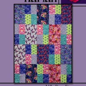 May include: A patchwork quilt titled "Maid Marian" by Villa Rosa Designs. The quilt features a variety of patterned squares in shades of blue, pink, green, and purple, with floral and butterfly motifs. A pink rose is in the upper right corner.