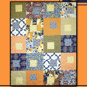 May include: A quilt pattern called "Summer Song" by Villa Rosa Designs. The quilt is made up of 16 squares, each with a different floral or geometric pattern in shades of blue, orange, yellow, and green. The quilt is surrounded by a border of blue and orange diamonds.