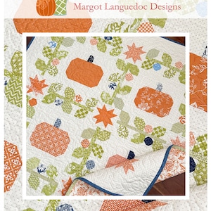 May include: A quilted fabric with an orange pumpkin design. The quilt features orange pumpkins, green leaves, and orange star shapes on a white background. The text "Pumpkin Patch" is at the bottom, with "The Pattern Basket" at the top.