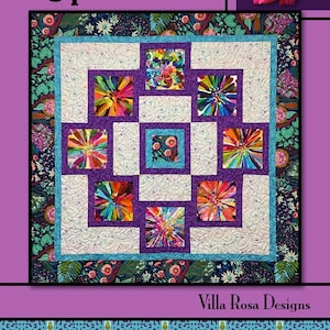 May include: A quilt pattern titled "Hypnotized" by Villa Rosa Designs. The quilt features a central square with a white background and nine smaller squares with colorful, swirling patterns. The smaller squares are framed by purple and blue borders. The quilt is surrounded by a dark blue border with a floral pattern.