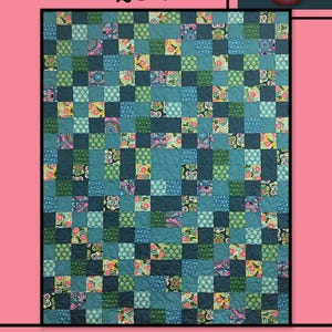 May include: A patchwork quilt with a variety of teal, blue, and green squares, some with floral patterns. The word "ANTIQUE" is at the top, and "Villa Rosa Designs" is at the bottom. A pink rose is in the upper right corner.