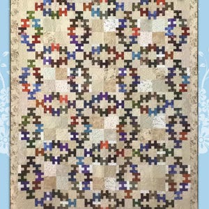 May include: A quilt pattern called "Summer Wedding" featuring a beige background with a repeating pattern of interlocking circles in shades of brown, blue, purple, and red. The pattern is designed by Jamie Janow Elfert and is available from Black Cat Creations.