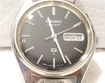 Vintage Seiko SQ Men's Day Date Watch Stainless Steel Black Dial Four Jewels Luminous Hands