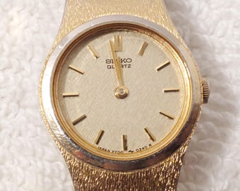 Vintage Seiko Quartz Base Metal St Steel Back V401-0289 Gold  display picture 1
