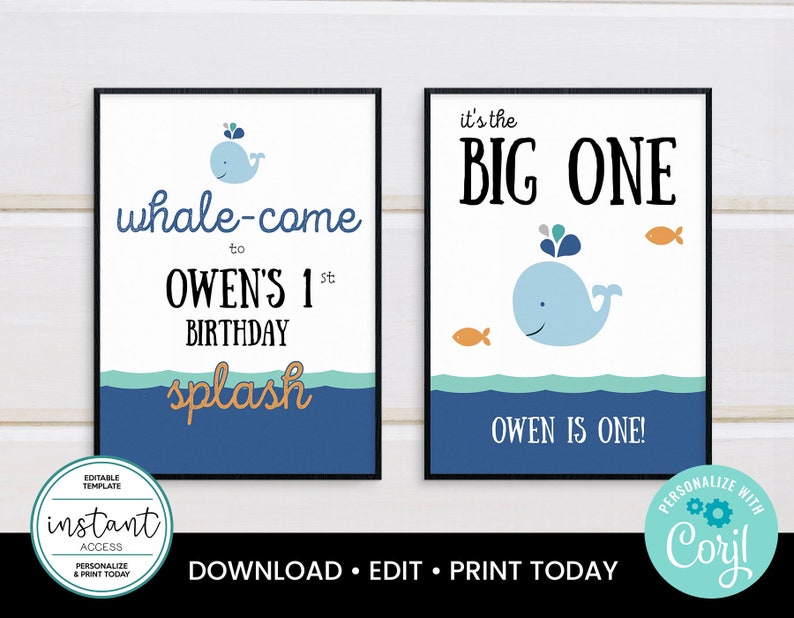 May include: Two framed birthday signs with a whale theme. One sign says "whale-come to Owen's 1st birthday splash". The other says "it's the BIG ONE" with a whale and fish. The signs are blue, white, and orange.