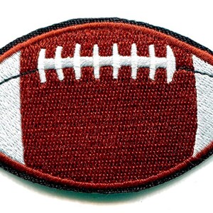 May include: An embroidered patch of a brown and white American football.