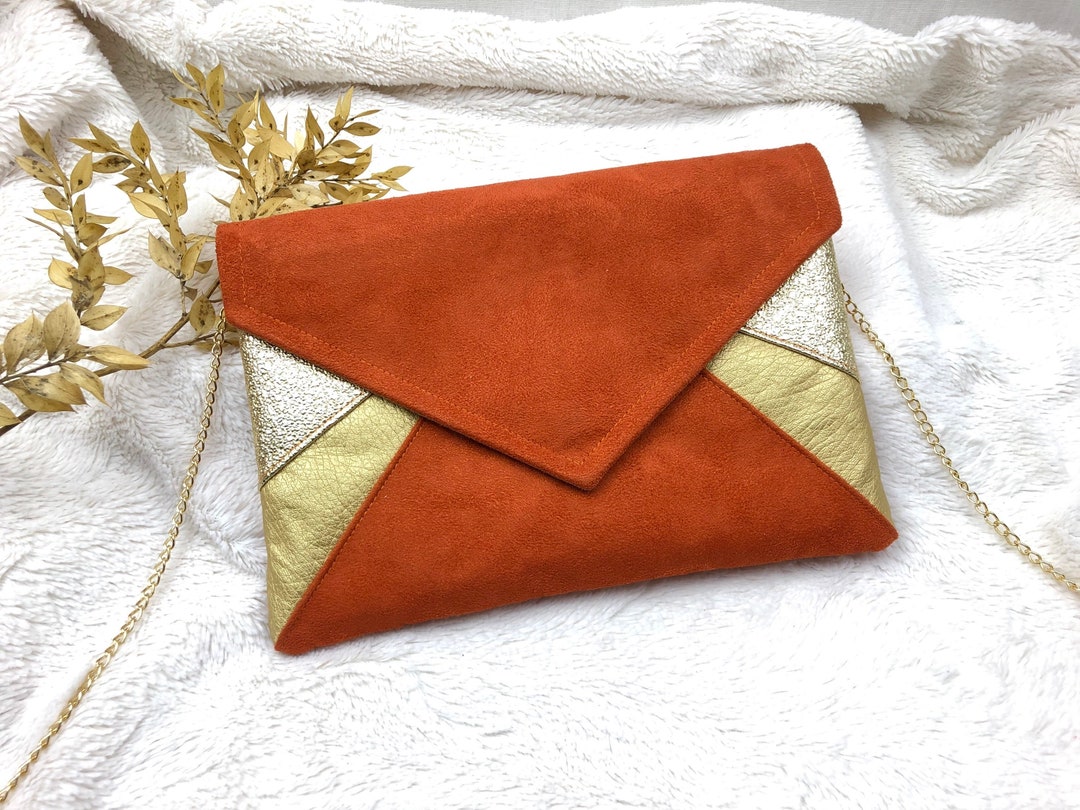 Orange and gold clutch bag hotsell