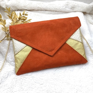 Orange and gold clutch bag sale