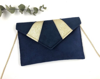 Pochette bleu marine et doré idéale pour ranger vos effets lors d'une soirée ou d'un mariage