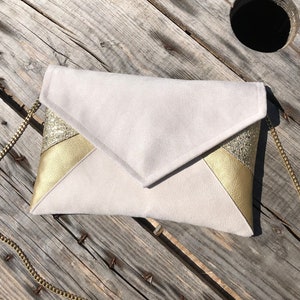 Ivory beige and gold clutch bag ideal for storing your belongings, weddings, evenings