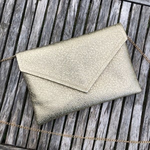 Golden envelope clutch ideal for a wedding or an evening