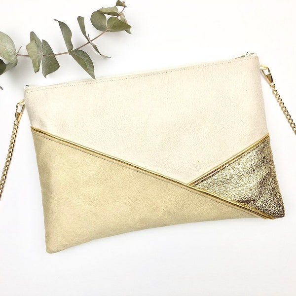 Beige and gold clutch perfect for accessorizing a summer outfit