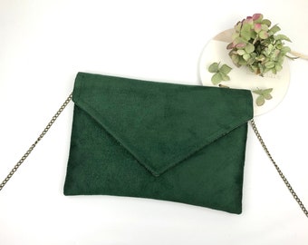 Green women's clutch bag ideal for storing essentials