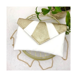 White and gold clutch bag ideal for a wedding, a ceremony, a bride