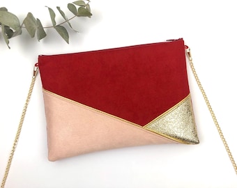 Powder pink and gold red clutch perfect for accessorizing an outfit