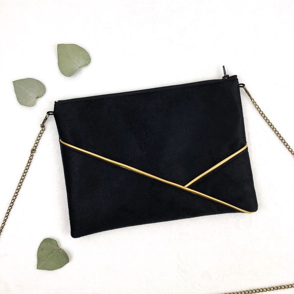 Pochette da donna nera e oro perfetta per una serata o una cerimonia