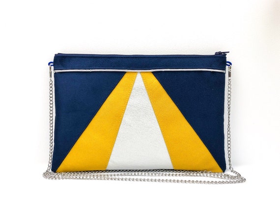navy and yellow clutch bag