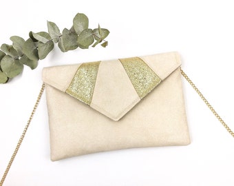 Pochette beige et dorée idéale pour une tenue de mariage ou de soirée