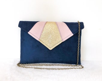 Navy blue pink and gold clutch ideal for storing your belongings during an evening or wedding