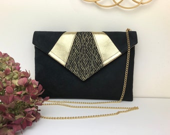 Black and gold evening pouch ideal for accessorizing an outfit