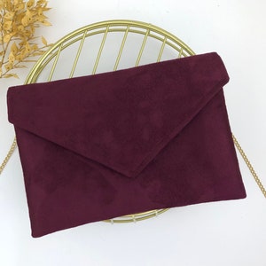 Plum burgundy envelope clutch ideal for storing the essentials for an evening image 7