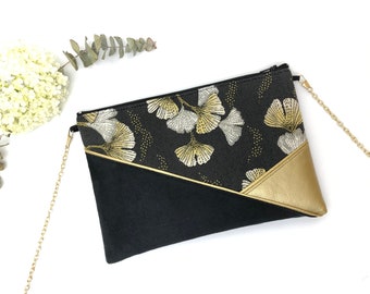 Pochette noire et or doré idéale pour une soirée