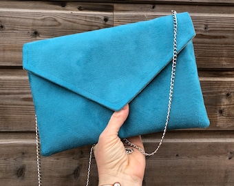 Turquoise women's clutch bag ideal for storing essentials