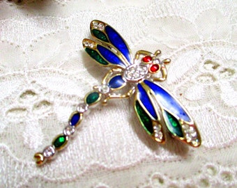 Elegant vintage brooch in the shape of a dragonfly enamelled green blue red silver colored cabouchon