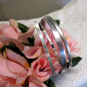 No 17 Four vintage silver bangles set of 4 silver 60s/70s 835 925 silver Mid Century