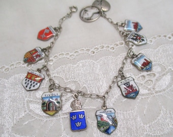 Sold!! Reserved!! Very old silver charm bracelet with ten coats of arms mainly 800 and 835 vintage charm bracelet coat of arms enamel bracelet