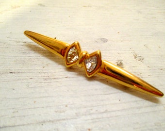 80s gilded vintage rod brooch with two crystal stones