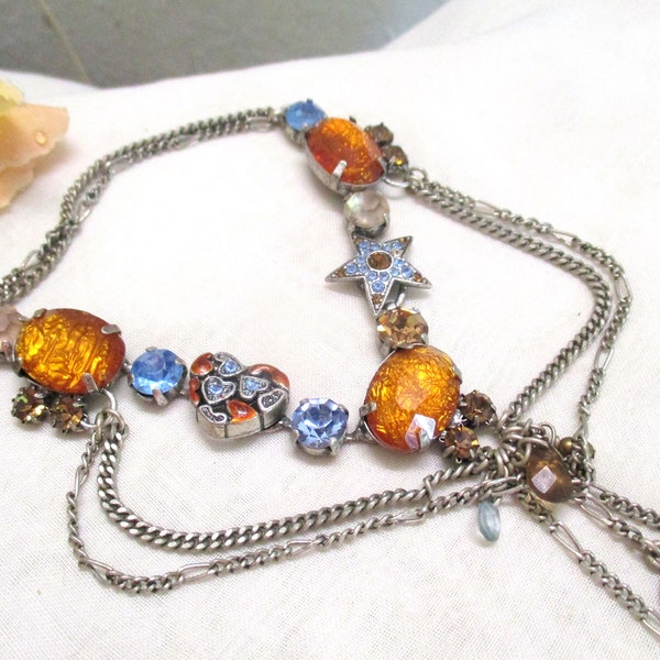 Magical fantasy necklace with colorful crystal stones in cognac and blue style like Rodrigo Otazu