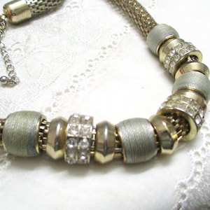 Gold-colored mesh chain snake chain with beads and rhinestones mesh