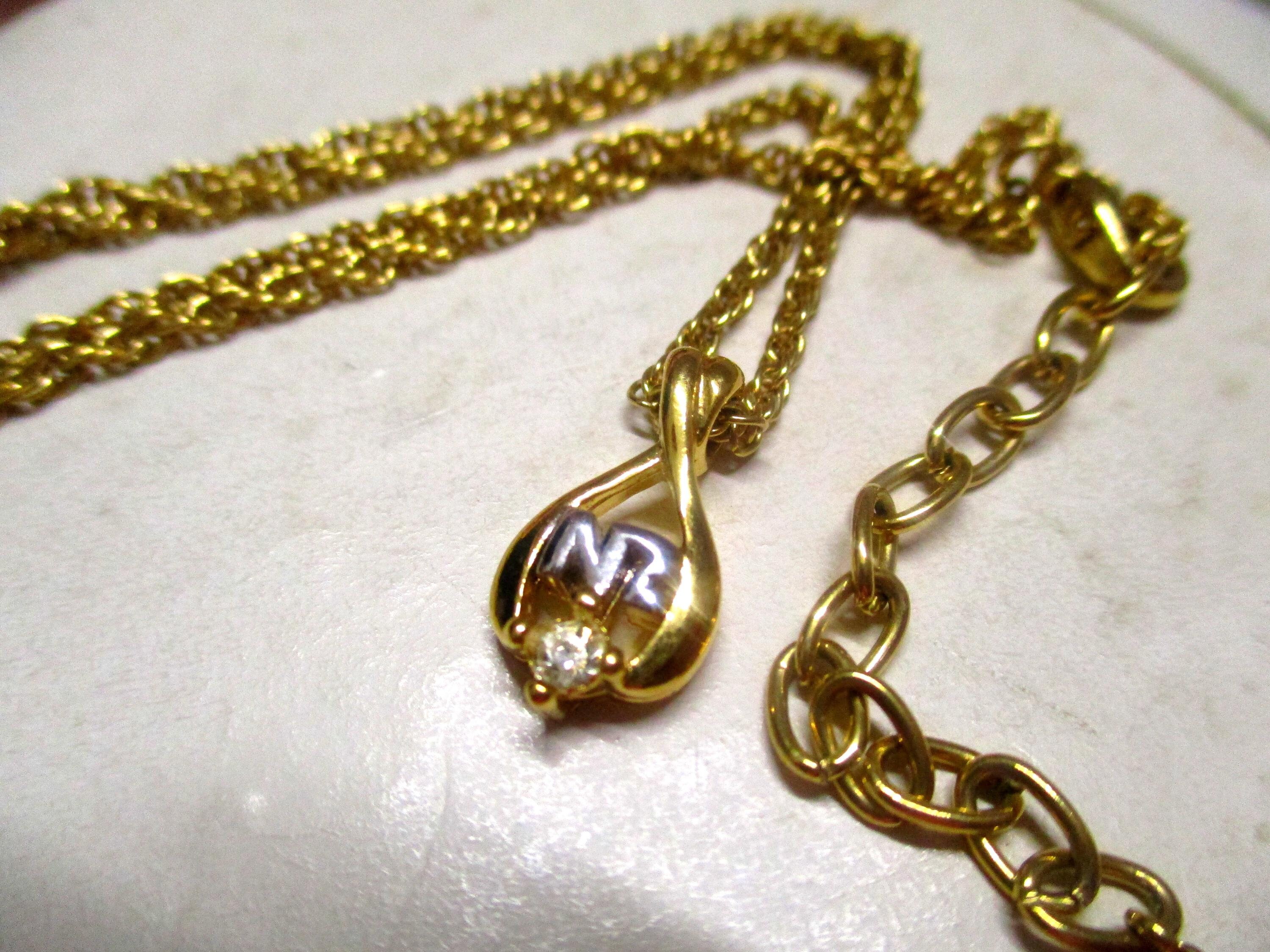 Collier Vintage Nina Ricci Doré Avec Fermoir Tête De Félin Strassé - Bijou D'occasion