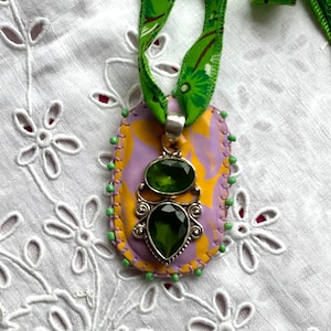 OOAK Gem stone and Silver Pendant mounted on a leather pad